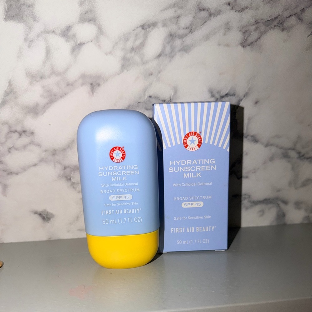 First Aid Beauty Hydrating Sunscreen Milk SPF 45 - Blue and Yellow